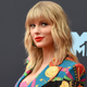 Image for article titled NHL team declares Taylor Swift a jinx, covers up cursed banner